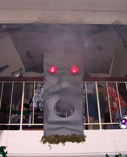 Giant Tiki Head blowing out smoke.