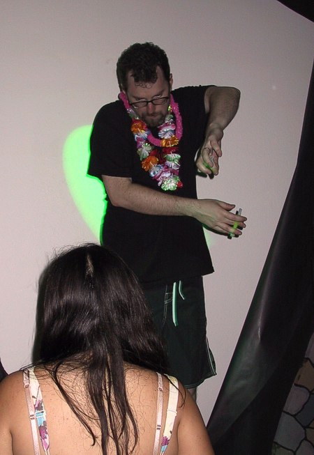 Phill gets into the go-go dancing with glowsticks