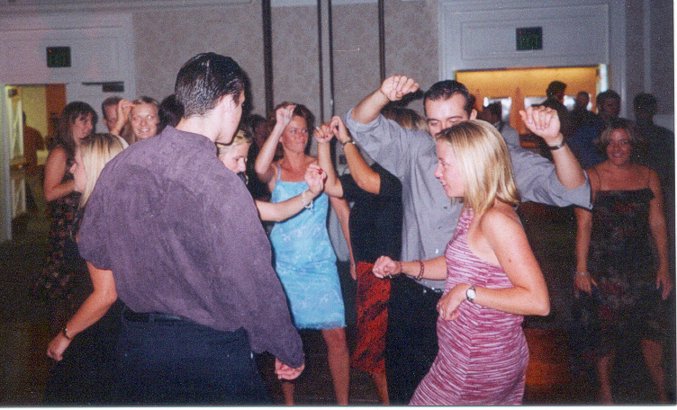 Jim, Brad, and girls dancing